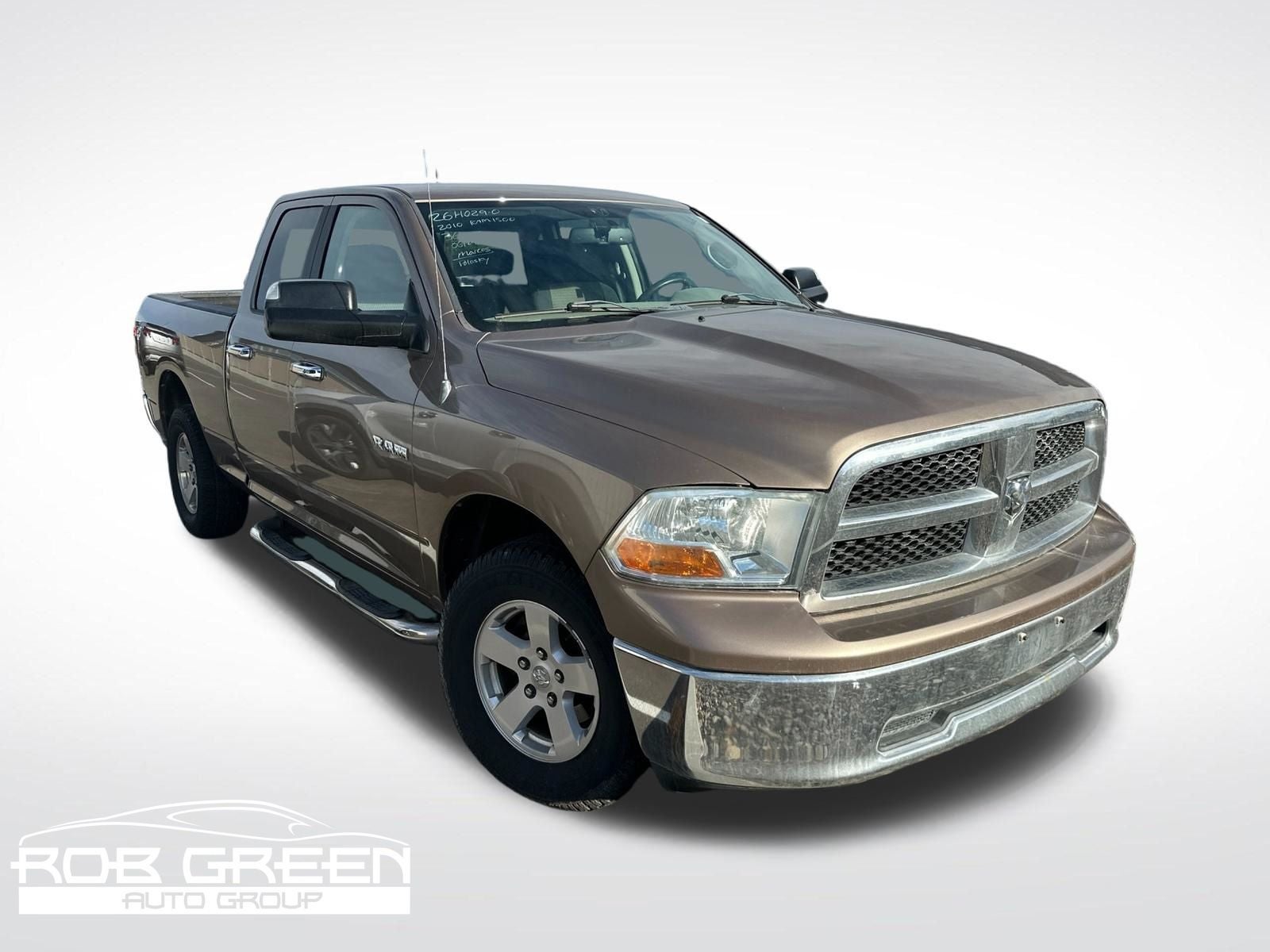 2010 RAM 1500 SLT in Austin Tan Pearlcoat/Light Graystone Pearlcoat — front three-quarter view