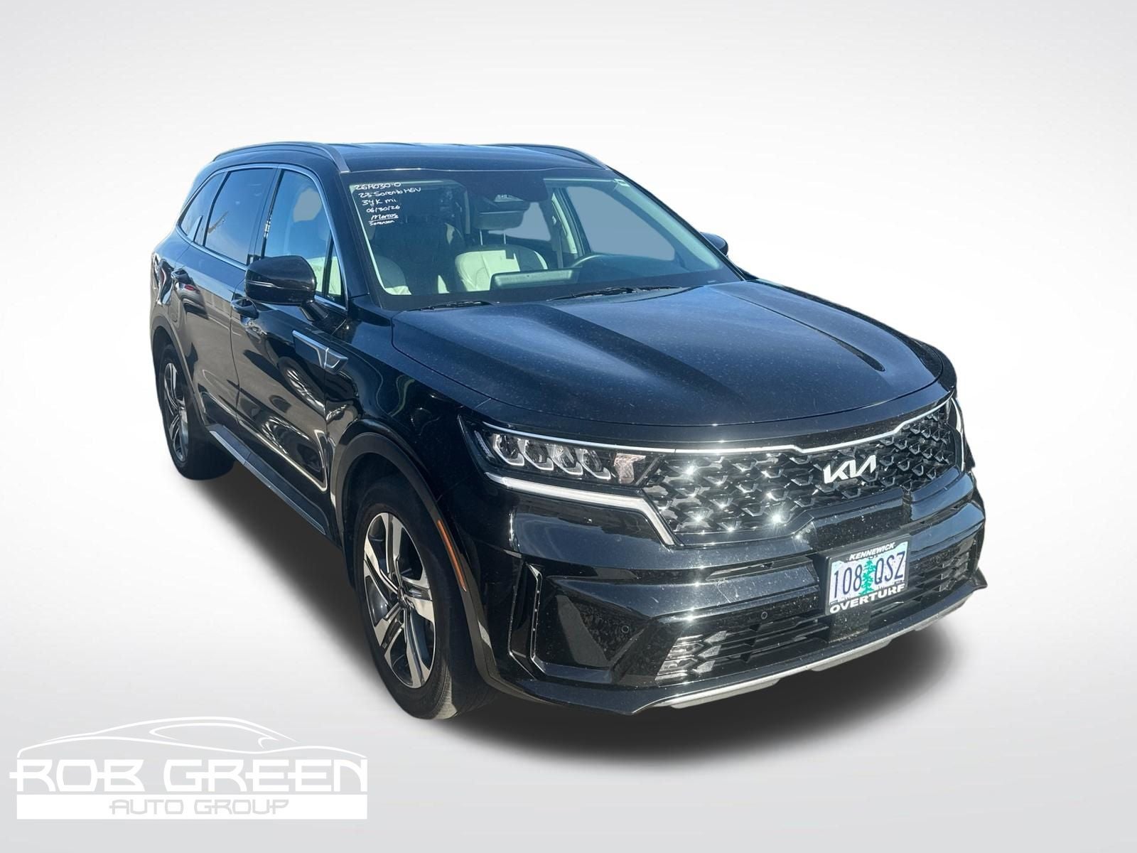 2023 Kia Sorento Hybrid EX in Aurora Black — front three-quarter view